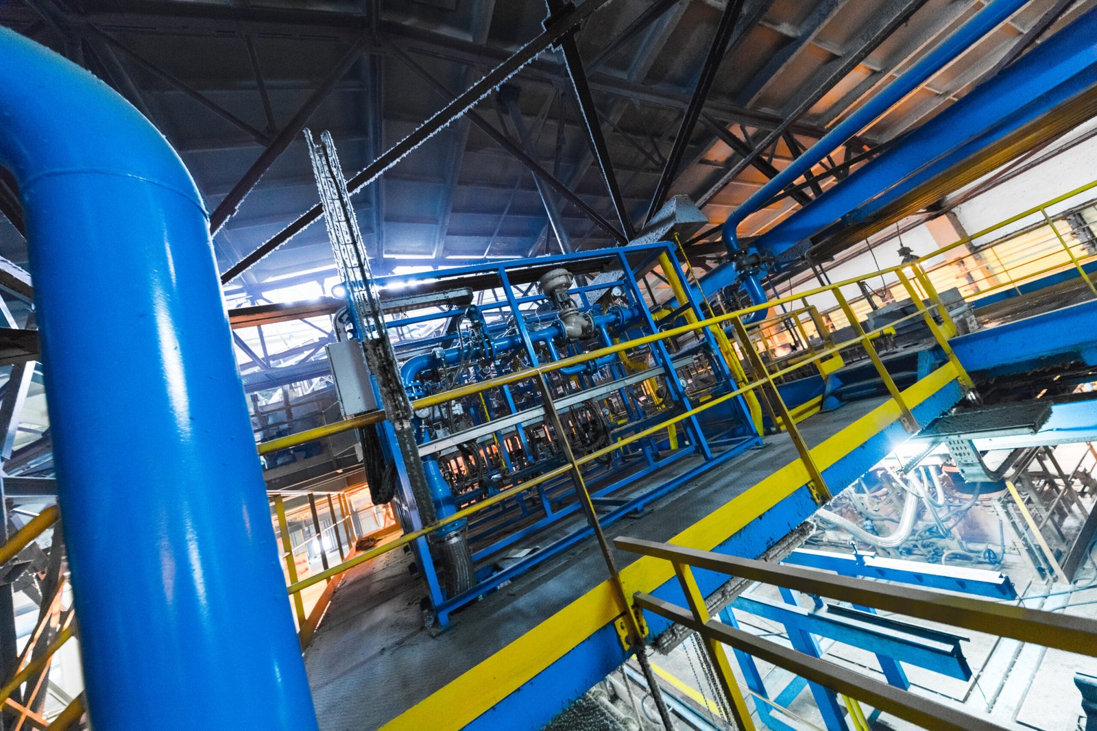 Fiberglass production industry equipment at manufacture background